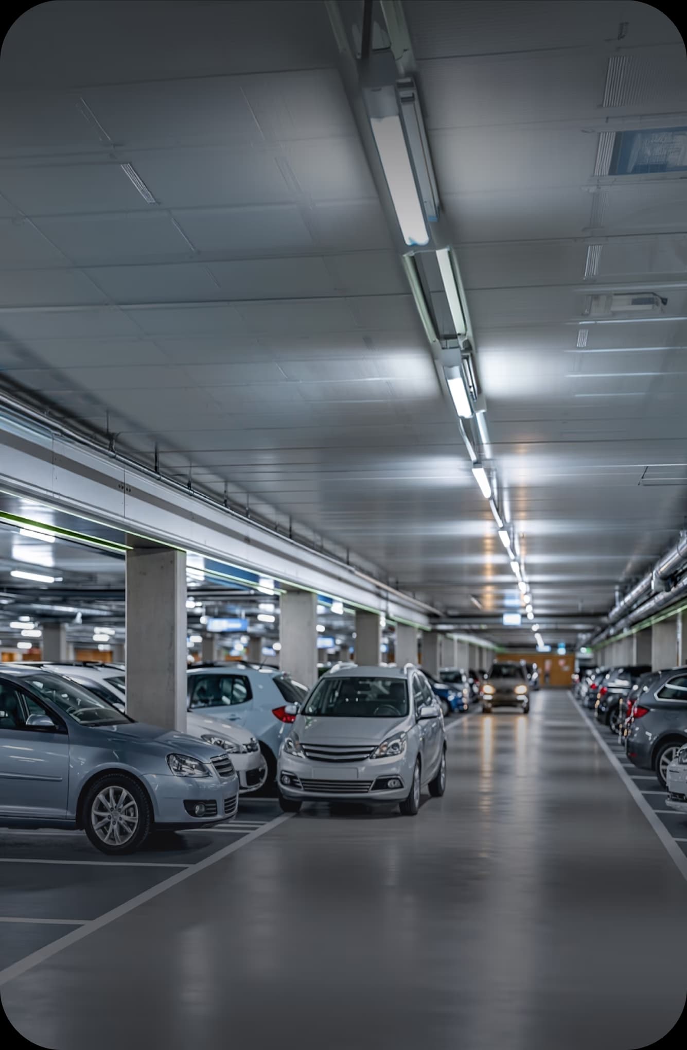 A blocked underground garage ramp with a narrow entrance